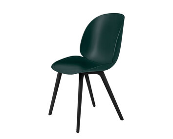 Beetle stol, ben i svart plast, sits i grön plast